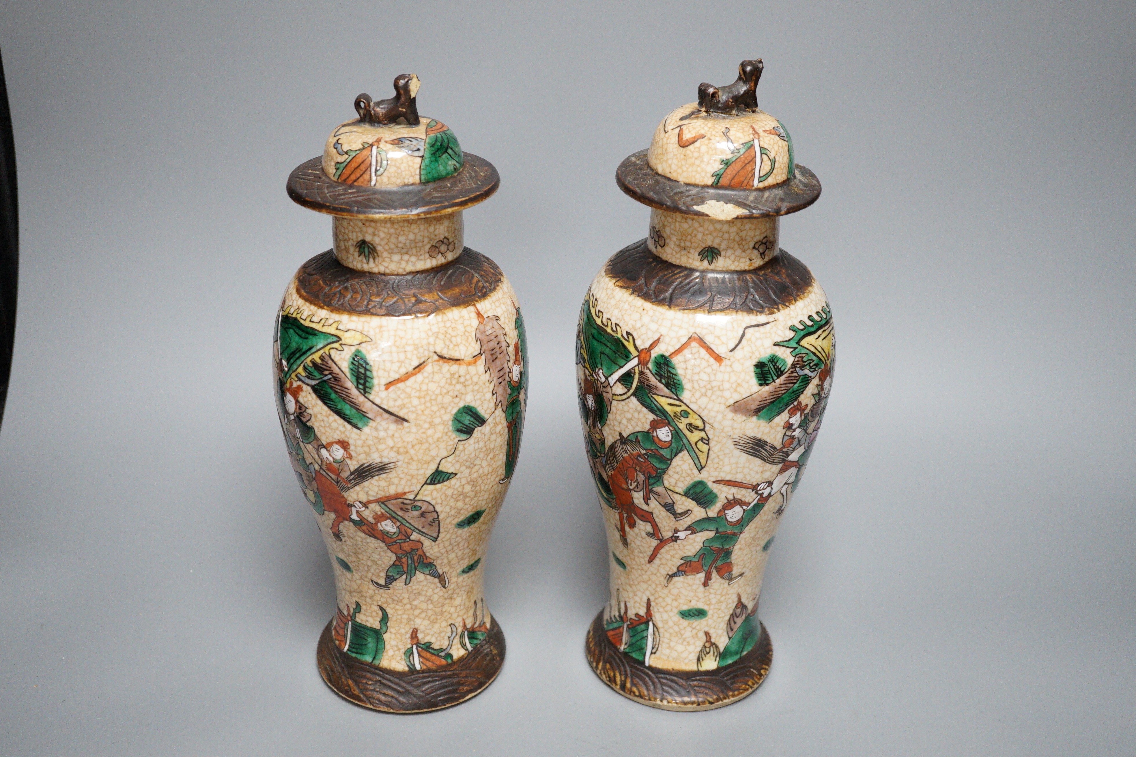 A pair of Chinese crackleware lidded vases, 30cm